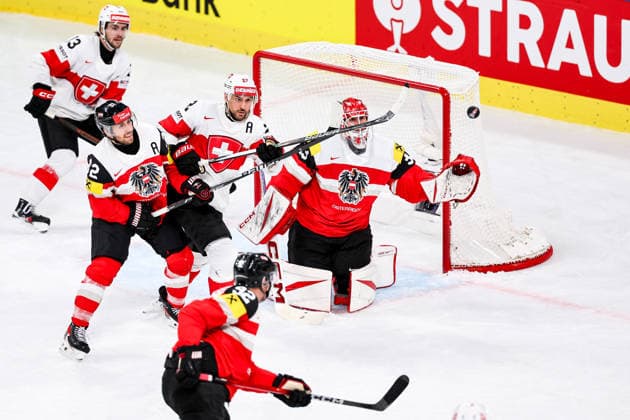 Ice hockey, Eishockey - IIHF WC 2026 ZURICH,SWITZERLAND,20.MAY.26 - ICE HOCKEY - IIHF Ice Hockey World Championship, WM, Weltmeisterschaft 2026, group stage, Austria vs Switzerland. Image shows Bernd Wolf (AUT), Nino Niederreiter (SUI) and Florian Vorauer (AUT).  GEPAxpictures xMaticxKlansek