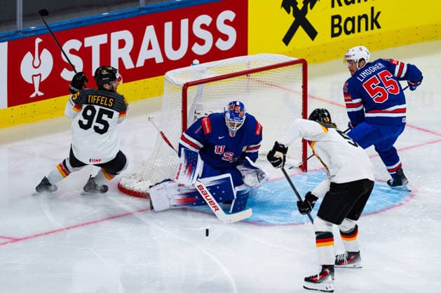 ZURICH, SWITZERLAND - MAY 20: Frederick Tiffels (Germany, 95) and Moritz Seider (Germany, 53) against Devin Cooley (United States, 1) during the Preliminary Round - Group A Match 27 between United States and Germany at the IIHF Ice hockey, Eishockey World Championship, WM, Weltmeisterschaft 2026, Swiss Life Arena on May 20, 2026 in Zurich, Switzerland. Zurich Switzerland Copyright: xTimoxSteinx