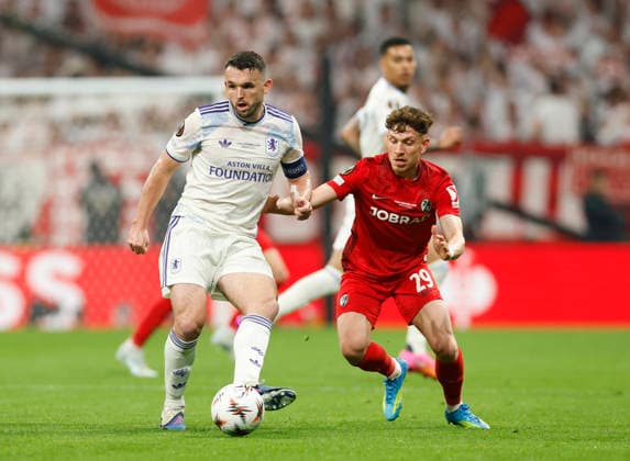 Istanbul, Turkey, 20th May 2026. John McGinn of Aston Villa and Philipp Treu of SC Freiburg during the SC Freiburg vs Aston Villa UEFA Europa League Final match at Besiktas Park, Istanbul. Picture credit should read: Cody Froggatt Sportimage EDITORIAL USE ONLY. No use with unauthorised audio, video, data, fixture lists, club league logos or live services. Online in-match use limited to 120 images, no video emulation. No use in betting, games or single club league player publications. SPI_067_CF_Frieburg_Aston_Villa SPI-4796-0097