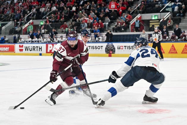ZURICH, SWITZERLAND - MAY 21: Haralds Egle of Latvia in action against Hannes Bjorninen of Finland during the 2026 IIHF Ice hockey, Eishockey World Championship, WM, Weltmeisterschaft Switzerland game between Latvia and Finland at Swiss Life Arena on May 21, 2026 in Zurich, Zurich. Zurich Swiss Life Arena Zurich Switzerland Copyright: xJustPictures.ch AndreaxBrancax jp-en-EuSpIm-JP7_ANB_Lat_Fin_21052026_0395