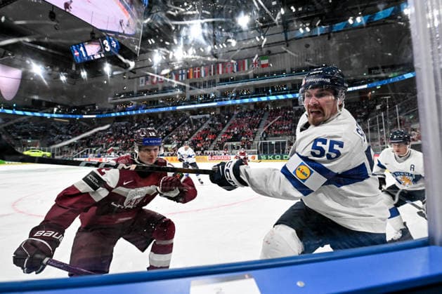 ZURICH, SWITZERLAND - MAY 21: Mikael Seppala of Finland and Glebs Prohorenkovs of Latvia in a battle along the boards during the 2026 IIHF Ice hockey, Eishockey World Championship, WM, Weltmeisterschaft Switzerland game between Latvia and Finland at Swiss Life Arena on May 21, 2026 in Zurich, Zurich. Zurich Swiss Life Arena Zurich Switzerland Copyright: xJustPictures.ch AndreaxBrancax jp-en-EuSpIm-JP7_ANB_Lat_Fin_21052026_9138