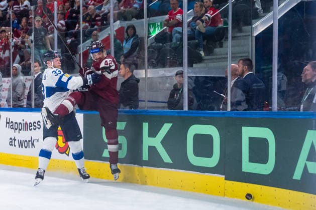 ZURICH, SWITZERLAND - MAY 21: Nikolas Matinpalo (Finland, 33) against Miks Tumanovs (Latvia, 42) during the Preliminary Round - Group A Match 29 between Latvia and Finland at the IIHF Ice hockey, Eishockey World Championship, WM, Weltmeisterschaft 2026, Swiss Life Arena on May 21, 2026 in Zurich, Switzerland. Zurich Switzerland Copyright: xTimoxSteinx