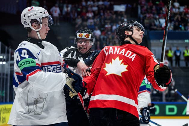 260521 Tinus Luc Koblar of Norway and Porter Martone of Canada during the 2026 IIHF Ice hockey, Eishockey World Championship, WM, Weltmeisterschaft between Canada and Norway on May 21, 2026 in Fribourg. Photo: Jesper Zerman BILDBYRAN kod JZ JZ0724 ishockey ice hockey ishockey-vm 2026 vm 2026 iihf world championship kanada canada norge norway canada kanada bbeng norge norway Copyright: JESPERxZERMAN BB260521JZ086