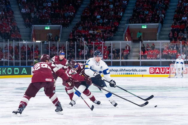 ZURICH, SWITZERLAND - MAY 21: Miks Tumanovs (Latvia, 42) in the battle for the puck with Olli Maeaettae (Finland, 3) during the Preliminary Round - Group A Match 29 between Latvia and Finland at the IIHF Ice hockey, Eishockey World Championship, WM, Weltmeisterschaft 2026, Swiss Life Arena on May 21, 2026 in Zurich, Switzerland. Zurich Switzerland Copyright: xTimoxSteinx