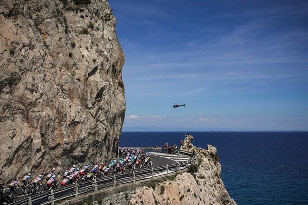 The pack rides during Stage 12 of the Giro d’Italia, from Imperia to Novi Ligure, Italy, Thursday, May 21, 2026.  Copyright: xMarcoxAlpozzi LaPressex