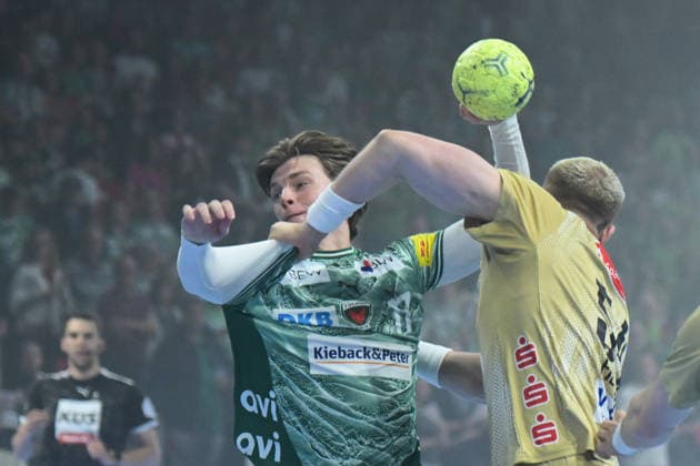 21.05.2026, xlakx, Handball Daikin HBL, Fuechse Berlin - TSV Hannover-Burgdorf v.l. Nils Lichtlein (Fuechse Berlin), Justus Fischer (TSV Hannover-Burgdorf) Zweikampf, Duell, Kampf, tackle Berlin