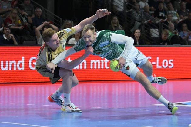 21.05.2026, xlakx, Handball Daikin HBL, Fuechse Berlin - TSV Hannover-Burgdorf v.l. Lukas Stutzke (TSV Hannover-Burgdorf), Mathias Gidsel (Fuechse Berlin) Zweikampf, Duell, Kampf, tackle Berlin