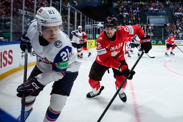 260521 Mikkel Eriksen of Norway and Evan Bouchard of Canada during the 2026 IIHF Ice hockey, Eishockey World Championship, WM, Weltmeisterschaft between Canada and Norway on May 21, 2026 in Fribourg. Photo: Jesper Zerman BILDBYRAN kod JZ JZ0724 ishockey ice hockey ishockey-vm 2026 vm 2026 iihf world championship kanada canada norge norway bbeng Copyright: JESPERxZERMAN BB260521JZ126