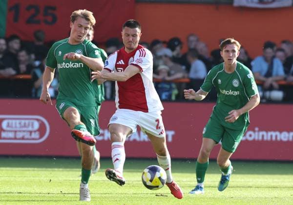 VOLENDAM - (lr) FC Groningen player Jorg Schreuders with Ajax player Steven Berghuis during the Dutch Eredivisie match between Ajax and FC Groningen at Kras Stadium on 21 May 2026 in Volendam, the Netherlands. (Photo by DeFodi Images) -