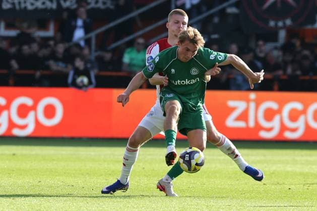 VOLENDAM - (lr) Ajax player Anton Gaaei with FC Groningen player Jorg Schreuders during the Dutch Eredivisie match between Ajax and FC Groningen at Kras Stadium on 21 May 2026 in Volendam, the Netherlands. (Photo by DeFodi Images) -
