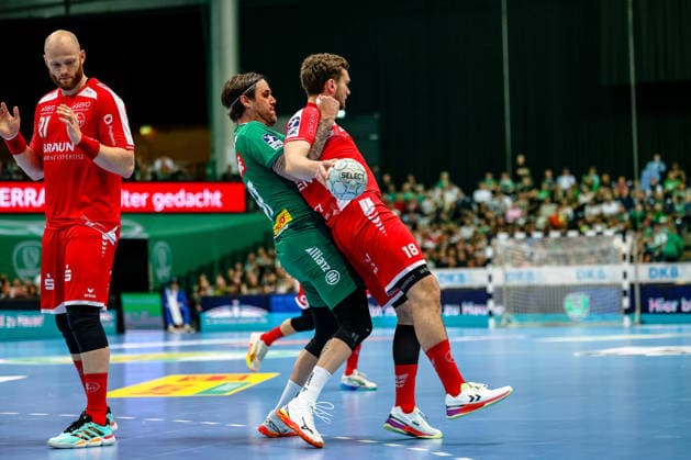 Dean Bombac (SC DHfK Leipzig, 67) Zweikampf, Duell, Kampf Florian Drosten (MT Melsungen, 18), SC DHfK Leipzig vs MT Melsungen, Handball, 1. Bundesliga, 32. Spieltag, Saison 2025 2026, 21.05.2026, SC DHfK Leipzig vs MT Meslungen, Handball, 1. Bundesliga, 32. Spieltag, Saison 2025 2026, 21.05.2026 Leipzig Copyright: xEibner-Pressefoto LauraxRoemerx EP_LRR
