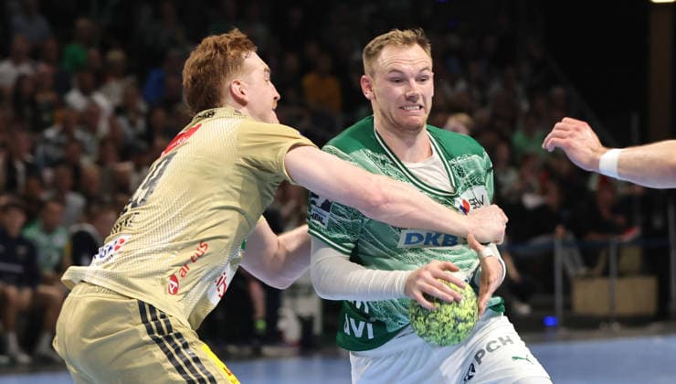 Lukas Stutzke, Mathias Gidsel am Ball Zweikampf Spielszene Aktion Handball HBL Bundesliga Herren 32. Spieltag Saison 2025 2026 21.05.2026 Füchse Berlin vs TSV Hannover Burgdorf