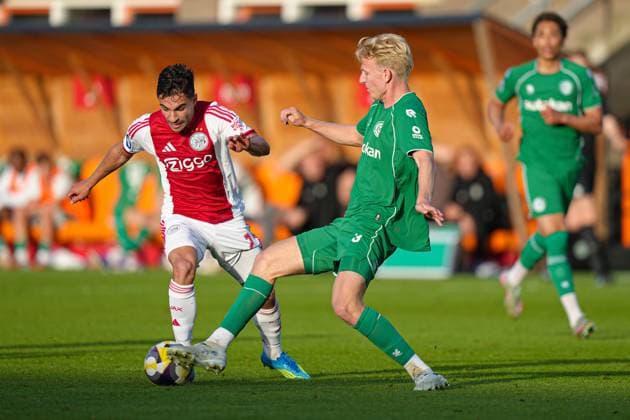 VOLENDAM , 21-05-2026 , Kras Stadium, season 2025 2026 , Play-offs for European football , Dutch Eredivisie Football . Match between Ajax and FC Groningen , picture shows Ajax player Lucas Rosa , FC Groningen player Thijmen Blokzijl Ajax - Groningen (play off)  x203866880x Copyright: