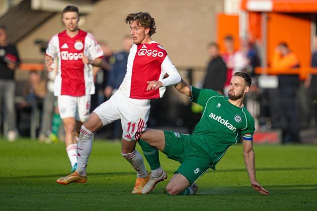 VOLENDAM , 21-05-2026 , Kras Stadium, season 2025 2026 , Play-offs for European football , Dutch Eredivisie Football . Match between Ajax and FC Groningen , picture shows Ajax player Mika Godts , FC Groningen player Marco Rente Ajax - Groningen (play off)  x203866886x Copyright: