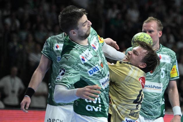 21.05.2026, xlakx, Handball Daikin HBL, Fuechse Berlin - TSV Hannover-Burgdorf v.l. Nejc Cehte (Fuechse Berlin), Thomas Alfred Solstad (TSV Hannover-Burgdorf) Zweikampf, Duell, Kampf, tackle Berlin