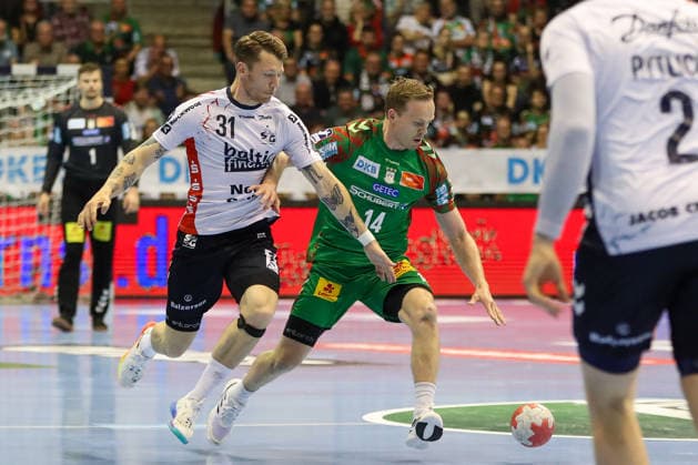 21.05.2026, xgox, Handball - Daikin HBL SC Magdeburg - SG Flensburg-Handewitt emspor, v.l. Emil Jakobsen (Flensburg, 31), Omar Ingi Magnusson (Magdeburg, 14) Zweikampf, Duell, Kampf, tackle Magdeburg