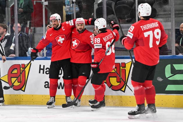 ZURICH, SWITZERLAND - MAY 21: Nino Niederreiter of Switzerland C) celebrates his goal with Roman Josi of Switzerland L), Christoph Bertschy of Switzerland R) and Calvin Thurkauf of Switzerland R) during the 2026 IIHF Ice hockey, Eishockey World Championship, WM, Weltmeisterschaft Switzerland game between Switzerland and Great Britain at Swiss Life Arena on May 21, 2026 in Zurich, Zurich. Zurich Swiss Life Arena Zurich Switzerland Copyright: xJustPictures.ch AndreaxBrancax jp-en-EuSpIm-JP7_ANB_Sui_GB_21052026_0610