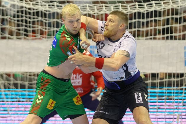21.05.2026, xtgx, Handball, Daikin HBL, SC Magdeburg - SG Flensburg Handewitt v.l. Magnus Saugstrup (Magdeburg, 23) Blaz Blagotsinek (Flensburg, 43) Zweikampf, Duell, Kampf, tackle Magdeburg