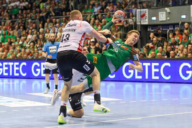 21.05.2026, xgox, Handball - Daikin HBL SC Magdeburg - SG Flensburg-Handewitt emspor, v.l. Blaz Blagotsinek (Flensburg, 43), Gisli Thorgeir Kristjansson (Magdeburg, 10) Zweikampf, Duell, Kampf, tackle Magdeburg