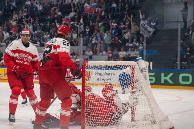 FRIBOURG, FRIBOURG - MAY 21: The puck crosses the goal line into the Denmark net as Slovakia supporters celebrate in the background during the 2026 IIHF World Championship, WM, Weltmeisterschaft Preliminary Round Group B match between Denmark and Slovakia at BCF Arena on May 21, 2026 in Fribourg, Fribourg, Switzerland. Copyright: xLivioxBaeriswylx xSPPx Sportspressphoto_SPR151241