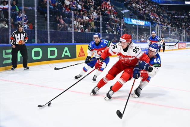 L-R Martin Fasko-Rudas of Slovakia, Nick Olesen of Denmark, Mislav Rosandic of Slovakia in action during the 2026 IIHF World Championship, WM, Weltmeisterschaft Group B, match Slovakia vs Denmark, Fribourg, Switzerland, on May 21, 2026. (CTKxPhoto RadekxPetrasek) CTKPhotoP2026052109267  CTKPhotoP2026052109267