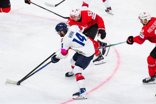 ZURICH, SWITZERLAND - MAY 21: Liam Kirk (Great Britain, 14) in the battle for the puck with Tim Berni (Switzerland, 56) during the Preliminary Round - Group A Match 31 between Switzerland and Great Britain at the IIHF Ice hockey, Eishockey World Championship, WM, Weltmeisterschaft 2026, Swiss Life Arena on May 21, 2026 in Zurich, Switzerland. Zurich Switzerland Copyright: xTimoxSteinx