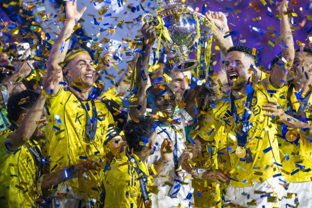 Al-Nassr wins Saudi Arabian title RIYADH, SAUDI ARABIA - MAY 21: Players of Al-Nassr celebrate the championship with trophy after defeating Damac 4-1 in the Saudi Pro League at King Saud University Stadium in Riyadh, Saudi Arabia, on May 21, 2026. Mohammed Saad Anadolu Riyadh Saudi Arabia. Editorial use only. Please get in touch for any other usage.  Copyright: x2026xAnadoluxMohammedxSaadx