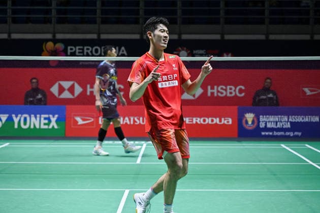 (260522) -- KUALA LUMPUR, May 22, 2026 -- Hu Zhe an celebrates after winning the men s singles quarterfinal match between Hu Zhe an of China and Jonatan Christie of Indonesia at 2026 Malaysia Masters badminton tournament in Kuala Lumpur, Malaysia, May 22, 2026. (Photo by Xinhua) (SP)MALAYSIA-KUALA LUMPUR-BADMINTON-MALAYSIA MASTERS-MEN S SINGLES ChongxVoonxChung 