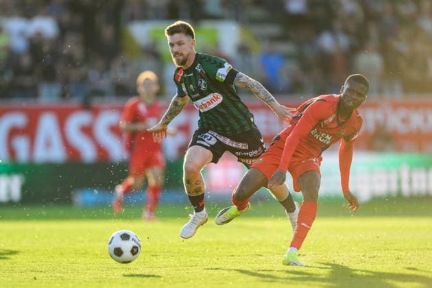 SOCCER - BL, Ried vs Rapid RIED,AUSTRIA,22.MAY.26 - SOCCER - ADMIRAL Bundesliga, Europacup play off, SV Ried vs SK Rapid Wien. Image shows Philipp Pomer (Ried) and Akouan Romeo Amane (Rapid).  GEPAxpictures xDanielaxMoser
