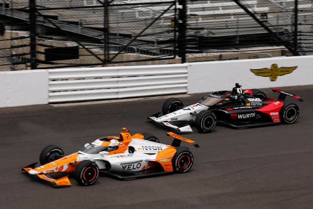 INDIANAPOLIS, IN - MAY 22: Christian Lundgaard, Christian Lundgaard of the 7 Arrow McLaren Chevrolet and Mick Schumacher, Mick Schumacher of the 47 Rahal Letterman Lanigan Honda go into turn one during practice for the NTT IndyCar, Indy Car, IRL, USA Series Miller Light Carb Day on May 22, 2026 at Indianapolis Motor Speedway in Indianapolis, IN. (Photo by Jeffrey Brown Icon Sportswire) AUTO: MAY 22 NTT IndyCar Series Miller Lite Carb Day EDITORIAL USE ONLY Icon052226038