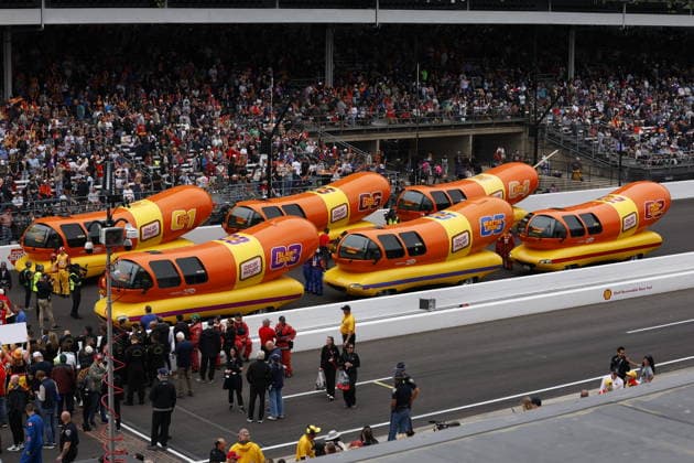 INDIANAPOLIS, IN - MAY 22: The Oscar Mayer Weiner Hot Dogs line up at the yard of bricks prior to the start of the Weiner 500 during the NTT IndyCar, Indy Car, IRL, USA Series Miller Light Carb Day on May 22, 2026 at Indianapolis Motor Speedway in Indianapolis, IN. (Photo by Jeffrey Brown Icon Sportswire) AUTO: MAY 22 NTT IndyCar Series Miller Lite Carb Day EDITORIAL USE ONLY Icon052226055