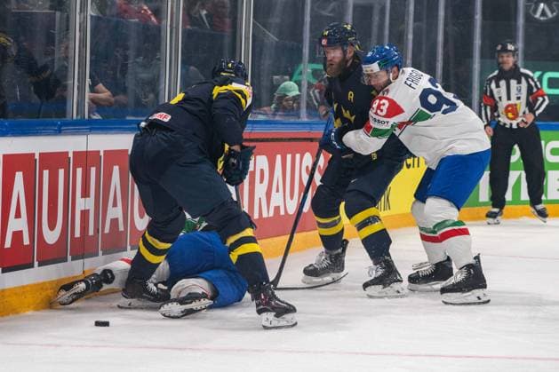 FRIBOURG, FRIBOURG - MAY 22: Jacob Larsson and Mattias Ekholm of Sweden battle with Luca Frigo and another Italy player, who lies on the ice, during the 2026 IIHF World Championship, WM, Weltmeisterschaft Preliminary Round Group B match between Sweden and Italy at BCF Arena on May 22, 2026 in Fribourg, Fribourg, Switzerland.  Copyright: xLivioxBaeriswylx xSPPx Sportspressphoto_SPR151977