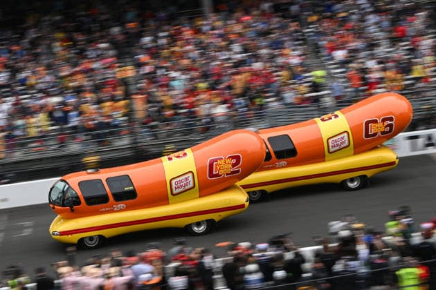INDIANAPOLIS, IN - MAY 24: The New York Dog (02) Oscar Mayer Wienie Mobile beats the Chili Dog Oscar Mayer Wienie Mobile to the finish line on the final lap of the Wienie 500 on NTT IndyCar, Indy Car, IRL, USA Series Miller Lite Carb Day on May 22, 2026, at the Indianapolis Motor Speedway in Indianapolis, Indiana. (Photo by Michael Allio Icon Sportswire) AUTO: MAY 22 NTT IndyCar Series Miller Lite Carb Day EDITORIAL USE ONLY Icon116260522001