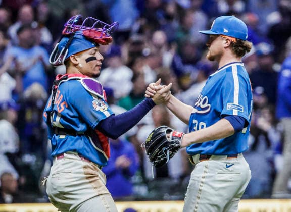 Milwaukee Brewers closing pitcher Chad Patrick (R) and Milwaukee Brewers catcher William Contreras (L) celebrate after the final out in the ninth inning of the MLB, Baseball Herren, USA game between the Los Angeles Dodgers and the Milwaukee Brewers at American Family Field in Milwaukee, Wisconsin on Friday, May 22, 2026. The Brewers defeated the Dodgers 5-1.  MIL202605228 TANNENxMAURY