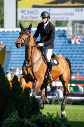 219 Richard Vogel on United Call JPS (GER) during the TSCHIO 2026 (CHIO 2026) - 2nd Competition Youngster-Tour - CSIYH1* - Jumping competition for young horses at the Allianz Park in Aachen, Germany  Copyright: xMartinxPitschx xSPPx Sportspressphoto_152058