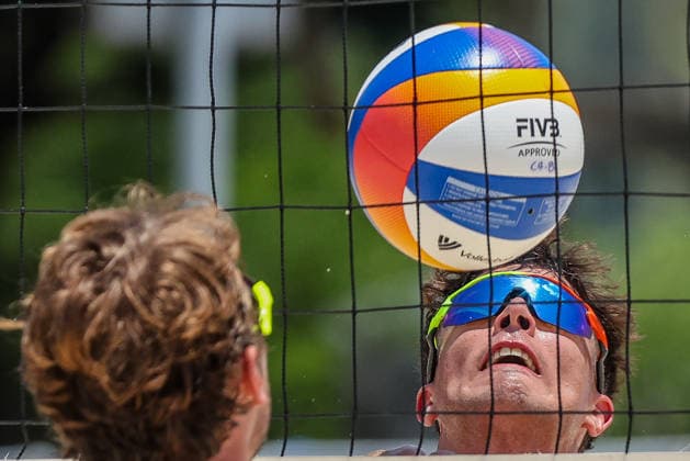 (260523) -- LAGUNA PROVINCE, May 23, 2026 -- Lui Wust (R) of Germany competes against Logan Webber of the United States during the men s round of 16 match between Maximillian Just Lui Wust of Germany and Timothy Brewster Logan Webber of the United States at the Volleyball World Beach Pro Tour Challenge in Laguna Province, the Philippines, May 23, 2026. ) (SP)PHILIPPINES-LAGUNA PROVINCE-VOLLEYBALL-WORLD BEACH PRO TOUR CHALLENGE RouellexUmali 