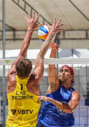 (260523) -- LAGUNA PROVINCE, May 23, 2026 -- Trevor Crabb (R) of the United States competes against Ardis Bedritis of Latvia during the men s round of 16 match between Ardis Bedritis Arturs Rinkevics of Latvia and Trevor Crabb Chase Budinger of the United States at the Volleyball World Beach Pro Tour Challenge in Laguna Province, the Philippines, May 23, 2026. ) (SP)PHILIPPINES-LAGUNA PROVINCE-VOLLEYBALL-WORLD BEACH PRO TOUR CHALLENGE RouellexUmali 