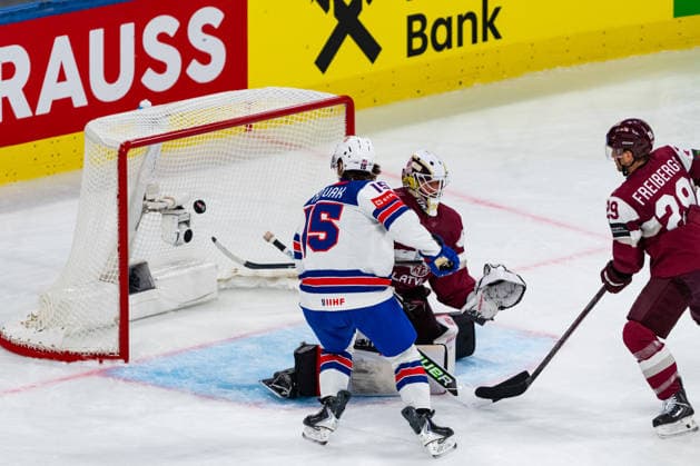 ZURICH, SWITZERLAND - MAY 23: Chance for Tommy Novak (United States, 15) in front of Kristers Gudlevskis (Latvia, 50) during the Preliminary Round - Group A Match 37 between Latvia and United States at the IIHF Ice hockey, Eishockey World Championship, WM, Weltmeisterschaft 2026, Swiss Life Arena on May 23, 2026 in Zurich, Switzerland. Zurich Switzerland Copyright: xTimoxSteinx