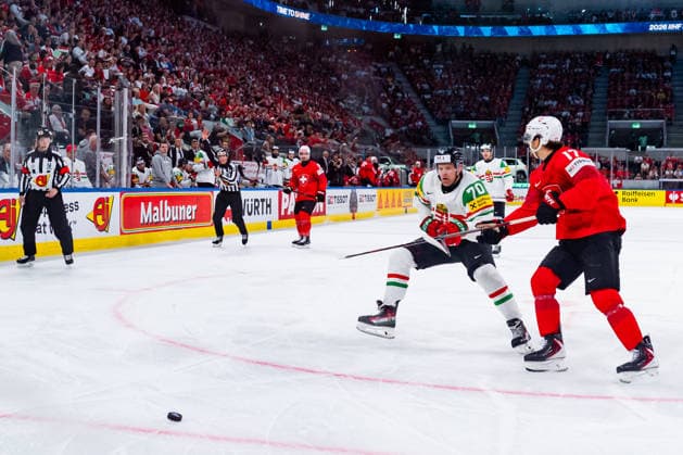 ZURICH, SWITZERLAND - MAY 23: Ken Jaeger (Switzerland, 17) in the battle for the puck with Zsombor Garat (Hungary, 70) during the Preliminary Round - Group A Match 39 between Switzerland and Hungary at the IIHF Ice hockey, Eishockey World Championship, WM, Weltmeisterschaft 2026, Swiss Life Arena on May 23, 2026 in Zurich, Switzerland. Zurich Switzerland Copyright: xTimoxSteinx