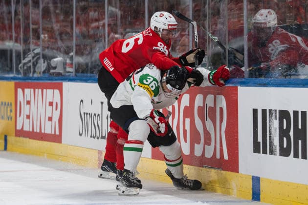 ZURICH, ZURICH - MAY 23: Janis Moser of Switzerland battles with Csanad Erdely of Hungary during the 2026 IIHF World Championship, WM, Weltmeisterschaft Preliminary Round Group A match between Switzerland and Hungary at Swiss Life Arena on May 23, 2026 in Zurich, Zurich, Switzerland.  Copyright: xLivioxBaeriswylx xSPPx Sportspressphoto_152426