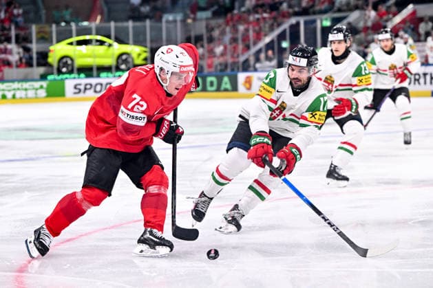 ZURICH, SWITZERLAND - MAY 23: Dominik Egli of Switzerland in action against Roland Kiss of Hungary during the 2026 IIHF Ice hockey, Eishockey World Championship, WM, Weltmeisterschaft Switzerland game between Switzerland and Hungary at Swiss Life Arena on May 23, 2026 in Zurich, Zurich. Zurich Swiss Life Arena Zurich Switzerland Copyright: xJustPictures.ch AndreaxBrancax jp-en-EuSpIm-JP7_ANB_Sui_Hung_23052026_3299