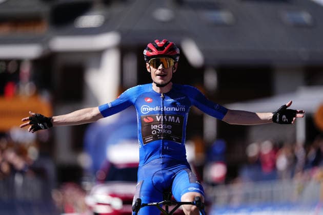The blue jersey Denmark™s Jonas Vingegaard Hansen of Team Visma Lease A Bike celebrates as he cycles to the finish line to win during Stage 14 of the Giro d™Italia, from Aosta to Pila, Italy, Saturday, May 23, 2026.  Copyright: xFabioxFerrari LaPressex