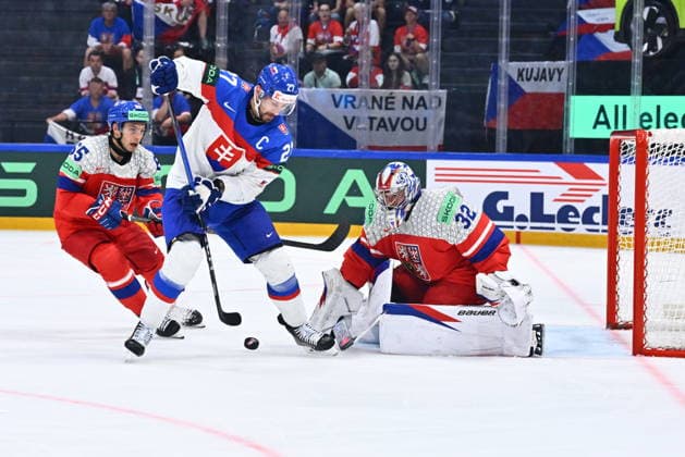 L-R Tomas Cibulka (CZE), Marek Hrivik (SVK) and goalkeeper Josef Korenar in action during the group B match of the World Ice hockey, Eishockey Championship, Slovakia - Czech Republic, Fribourg, Switzerland, on May 23, 2026. (CTKxPhoto RadekxPetrasek) CTKPhotoP2026052304972  CTKPhotoP2026052304972