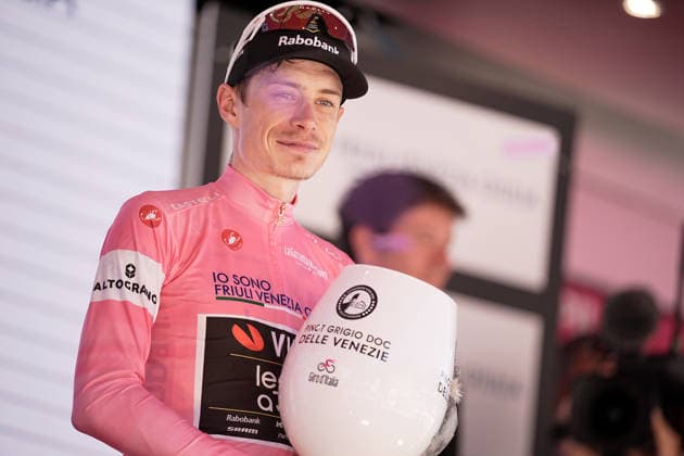 The pink jersey Denmark™s Jonas Vingegaard Hansen of Team Visma Lease A Bike celebrate on the podium after the Stage 14 of the Giro d™Italia, from Aosta to Pila, Italy, Saturday, May 23, 2026.  Copyright: xMarcoxAlpozzi LaPressex