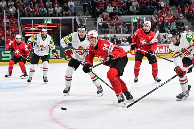 ZURICH, SWITZERLAND - MAY 23: Attilio Biasca of Switzerland in a battle for the puck during the 2026 IIHF Ice hockey, Eishockey World Championship, WM, Weltmeisterschaft Switzerland game between Switzerland and Hungary at Swiss Life Arena on May 23, 2026 in Zurich, Zurich. Zurich Swiss Life Arena Zurich Switzerland Copyright: xJustPictures.ch AndreaxBrancax jp-en-EuSpIm-JP7_ANB_Sui_Hung_23052026_4566
