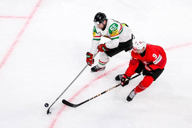 Ice hockey, Eishockey - IIHF WC 2026 ZURICH,SWITZERLAND,23.MAY.26 - ICE HOCKEY - IIHF Ice Hockey World Championship, WM, Weltmeisterschaft 2026, group stage, Switzerland vs Hungary. Image shows Tamas Ortenszky (HUN) and Damien Riat (SUI).  GEPAxpictures xMaticxKlansek