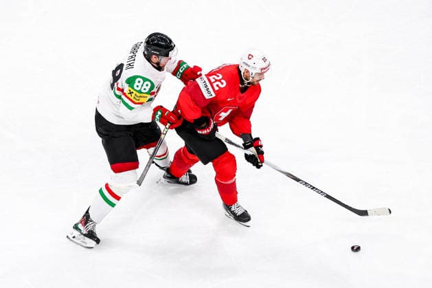 Ice hockey, Eishockey - IIHF WC 2026 ZURICH,SWITZERLAND,23.MAY.26 - ICE HOCKEY - IIHF Ice Hockey World Championship, WM, Weltmeisterschaft 2026, group stage, Switzerland vs Hungary. Image shows Tamas Sarpatki (HUN) and Nino Niederreiter (SUI).  GEPAxpictures xMaticxKlansek