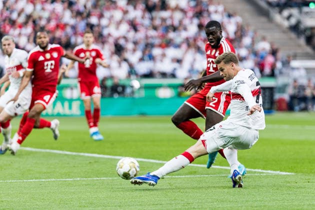 BERLIN, GERMANY - MAY 23: Maximilian Mittelstaedt (Mittelstädt, Mittelstadt, VfB Stuttgart, 7) controls the ball against Dayot Upamecano (FC Bayern Muenchen, 2) during the DFB Pokal Final match between FC Bayern Muenchen vs. VfB Stuttgart at Olympic Stadium on May 23, 2026 in Berlin, Germany. DFB REGULATIONS PROHIBIT ANY USE OF PHOTOGRAPHS AS IMAGE SEQUENCES AND OR QUASI-VIDEO. Berlin Germany Copyright: xSteffiexWunderlx