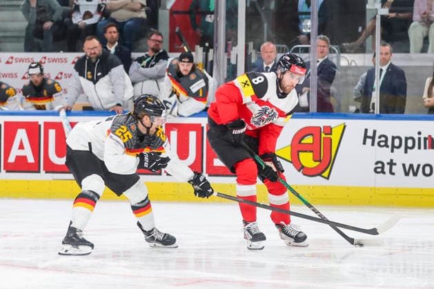 Ice hockey, Eishockey - IIHF WC 2026 ZURICH,SWITZERLAND,23.MAY.26 - ICE HOCKEY - IIHF Ice Hockey World Championship, WM, Weltmeisterschaft 2026, group stage, Austria vs Germany. Image shows Leon Huttl (GER) and Maximilian Rebernig (AUT).  GEPAxpictures xMaticxKlansek