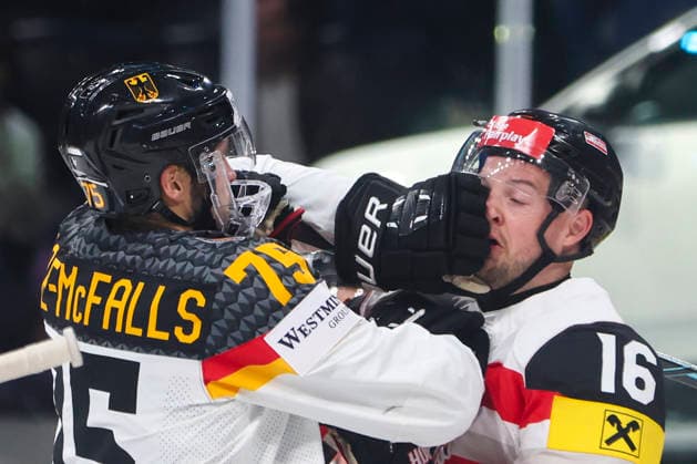 Ice hockey, Eishockey - IIHF WC 2026 ZURICH,SWITZERLAND,23.MAY.26 - ICE HOCKEY - IIHF Ice Hockey World Championship, WM, Weltmeisterschaft 2026, group stage, Austria vs Germany. Image shows Samuel Dove-McFalls (GER) and Dominic Zwerger (AUT)  GEPAxpictures xMaticxKlansek